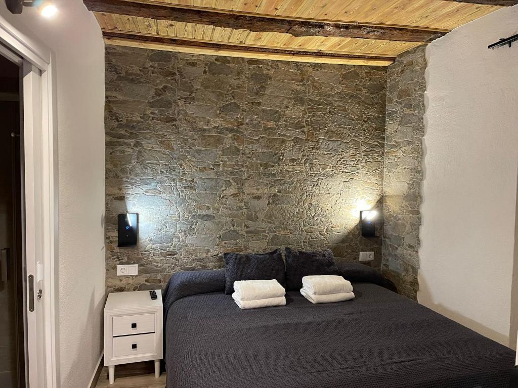 Llit o llits en una habitació de Hostal Rusó SC