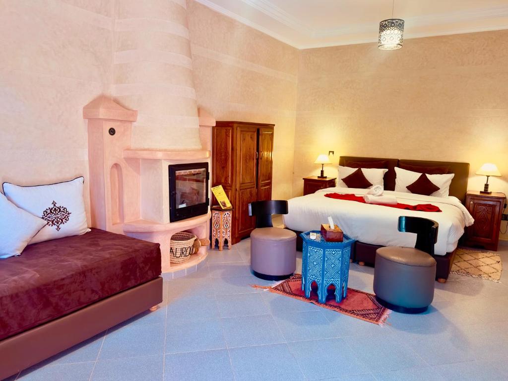 Postel nebo postele na pokoji v ubytování Aurocher Marrakech Ourika Oukaimeden