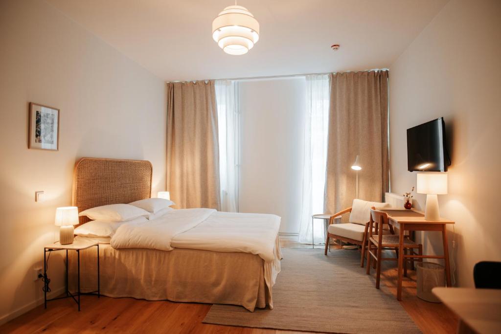 Postel nebo postele na pokoji v ubytování The Lab Hotel