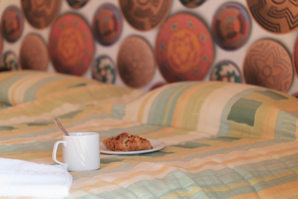 Postel nebo postele na pokoji v ubytování SERENGETI NAP comfy rooms