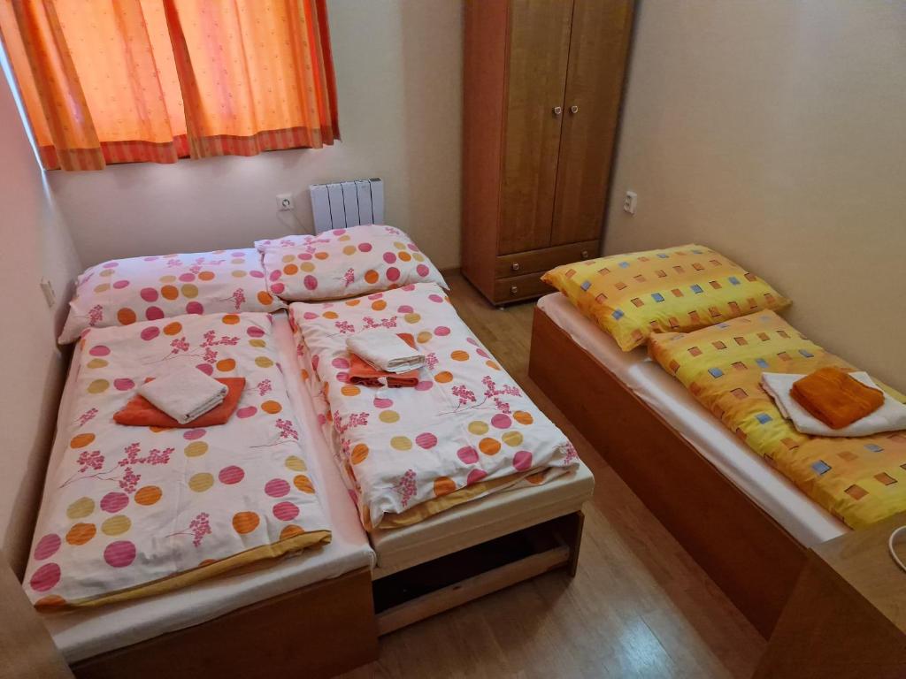 Postel nebo postele na pokoji v ubytování Apartmán Borgi