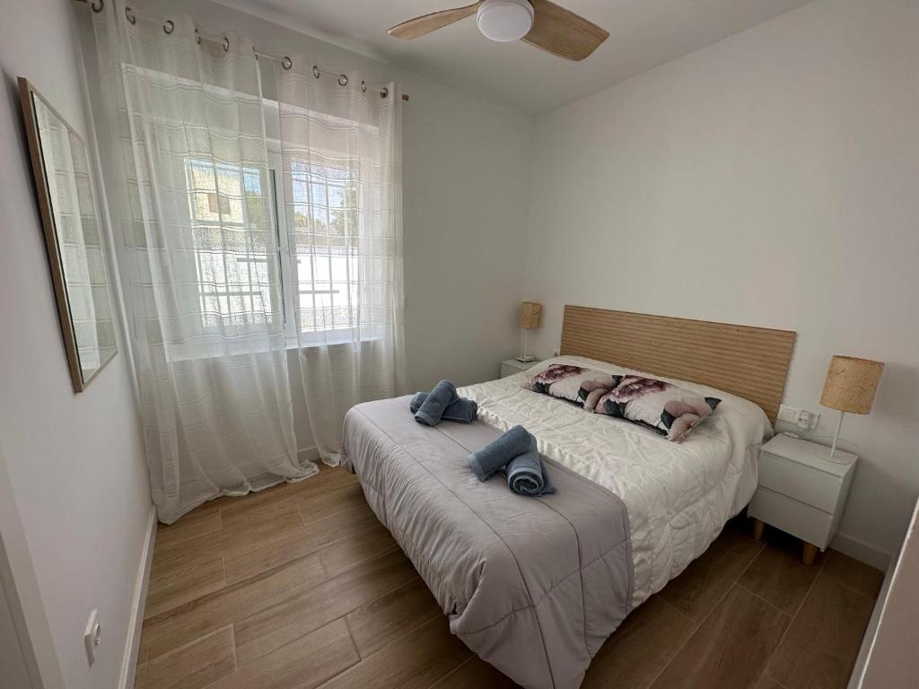 Ένα ή περισσότερα κρεβάτια σε δωμάτιο στο La Casita