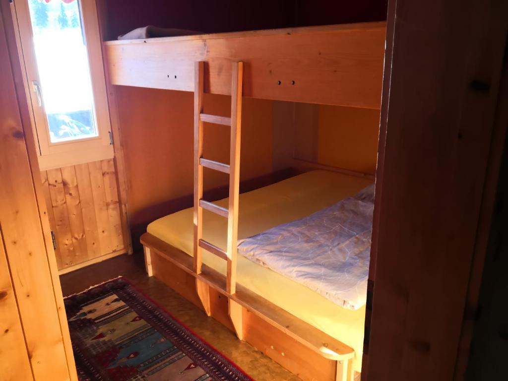 Postel nebo postele na pokoji v ubytování Haus Chalet Beverin
