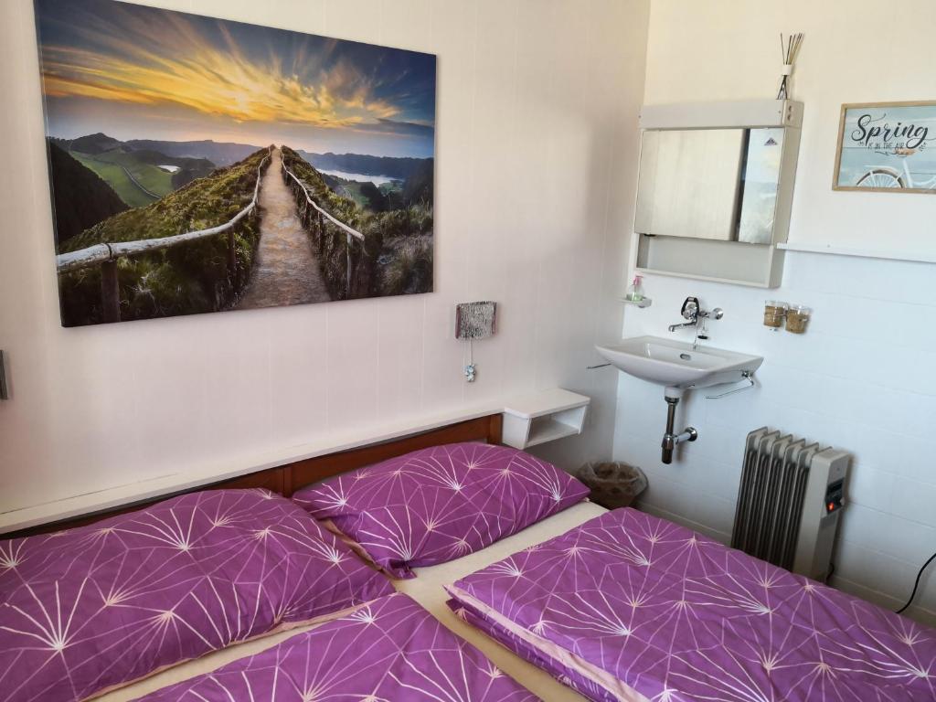 Postel nebo postele na pokoji v ubytování Haus Chalet Beverin