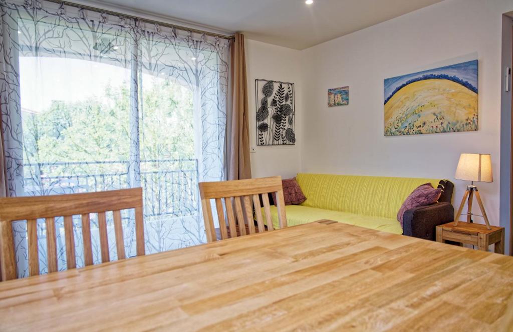 Postel nebo postele na pokoji v ubytování Les Mûriers "Scopa"