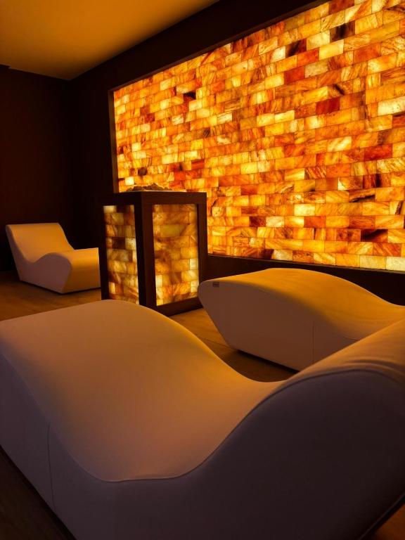 Postel nebo postele na pokoji v ubytování Hotel Lemi