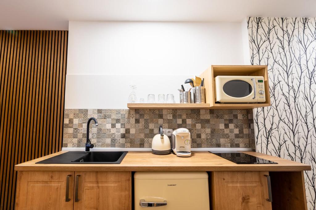 Kuchyň nebo kuchyňský kout v ubytování Apartmány Brychovi