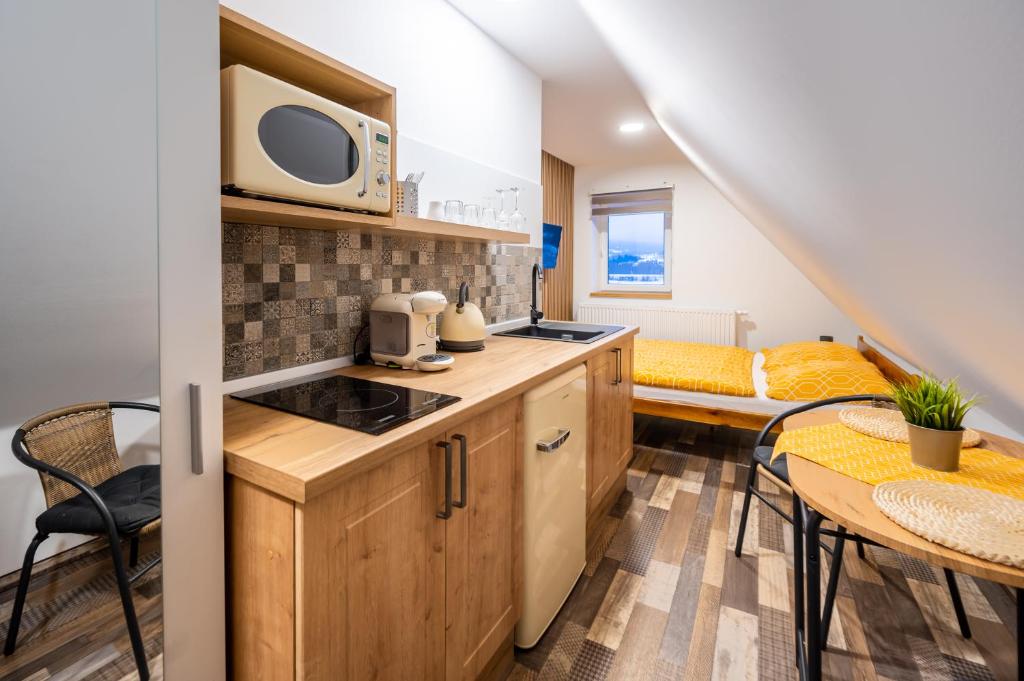 Kuchyň nebo kuchyňský kout v ubytování Apartmány Brychovi