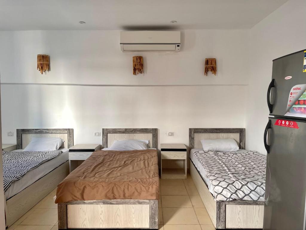 Postel nebo postele na pokoji v ubytování Sky Dahab Hotel