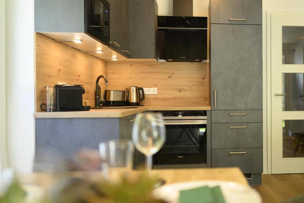 Kuchyň nebo kuchyňský kout v ubytování Ferienwohnung Am Kofel