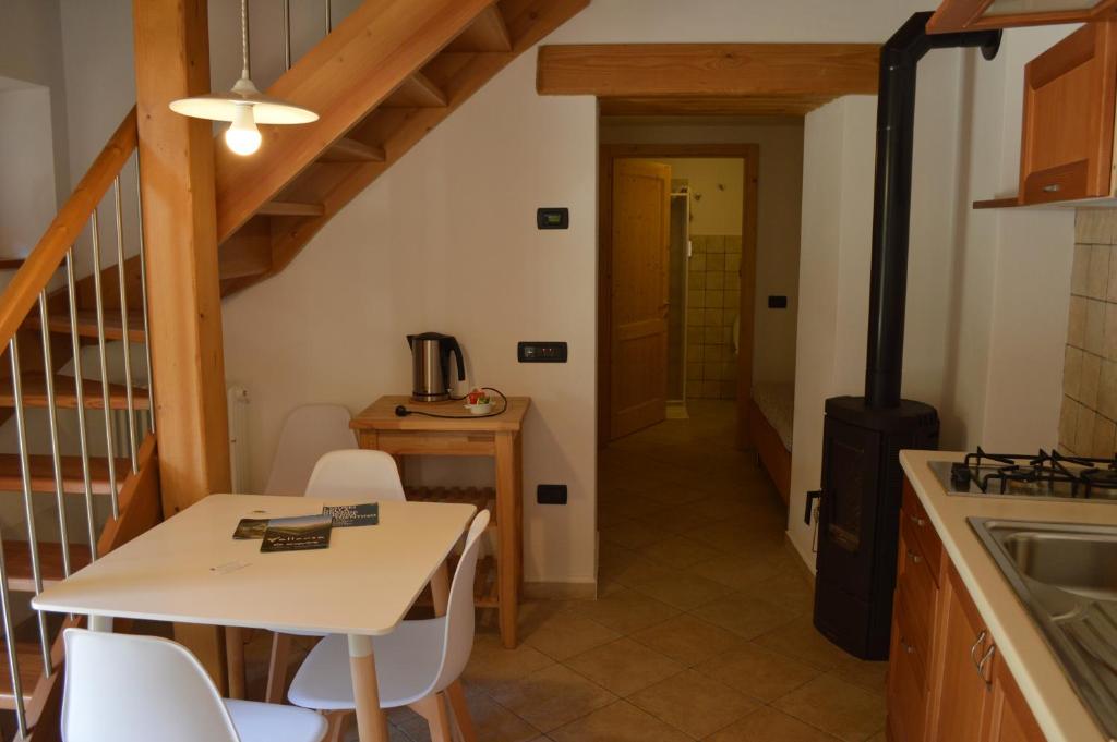 Kuchyň nebo kuchyňský kout v ubytování B&B Arlanch 8