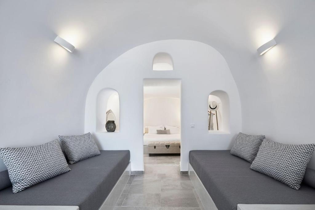 A seating area at Amaya Sensational Villa Caldera View-Outdoor Hot Tub Oia Santorini