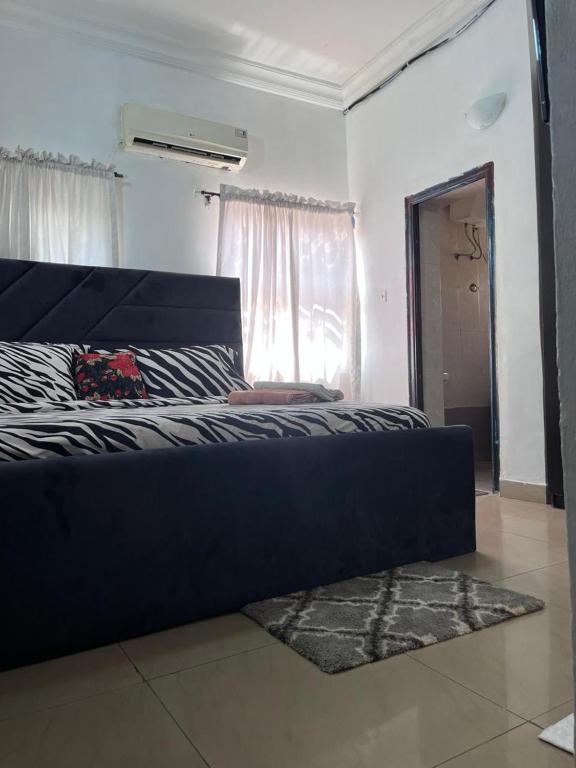 Postel nebo postele na pokoji v ubytování Miraph Apartment