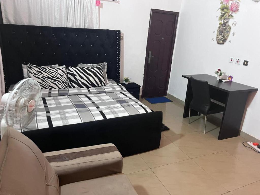 Postel nebo postele na pokoji v ubytování Miraph Apartment