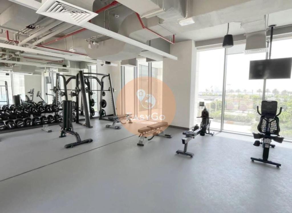 Fitness centrum a/nebo fitness zařízení v ubytování EasyGo - Exceptional 2BDR- Large Terrace-Pool Access