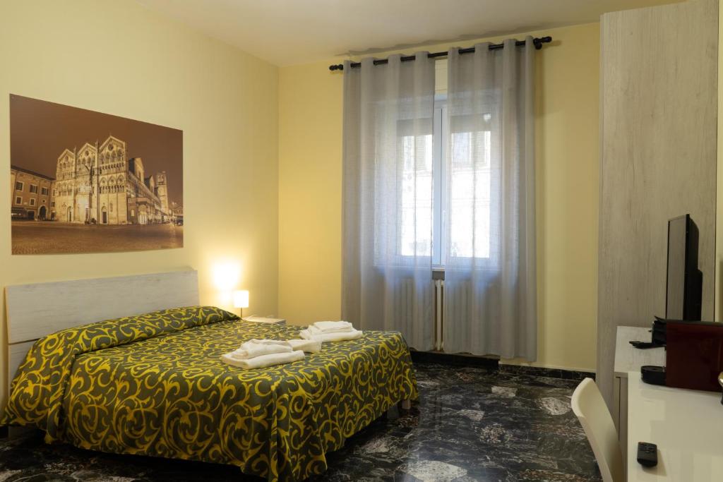 CameraCafè - Economy Triple Room Con Baño Compartido