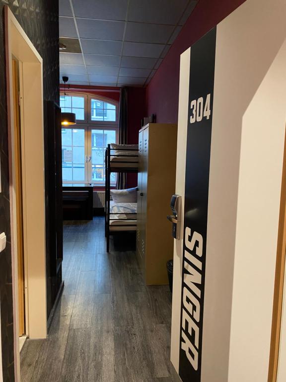 Singer109 Hostel, Hotel & Apartment - 4床位混合宿舍间的床位