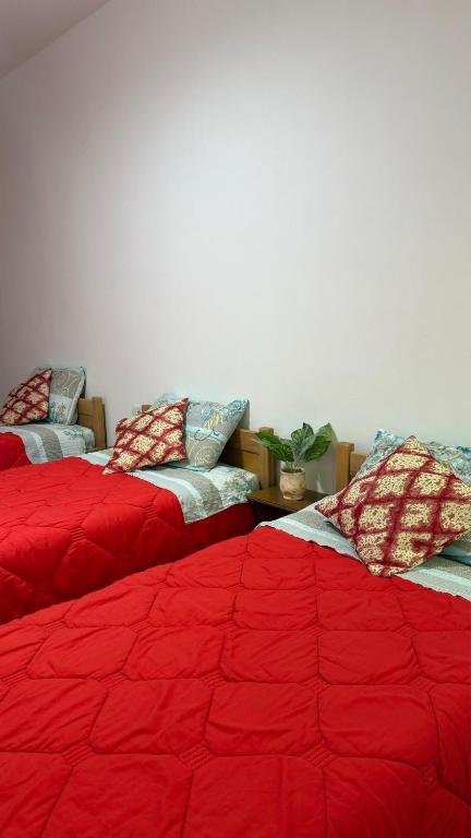 Łóżko lub łóżka w pokoju w obiekcie Guesthouse Makry