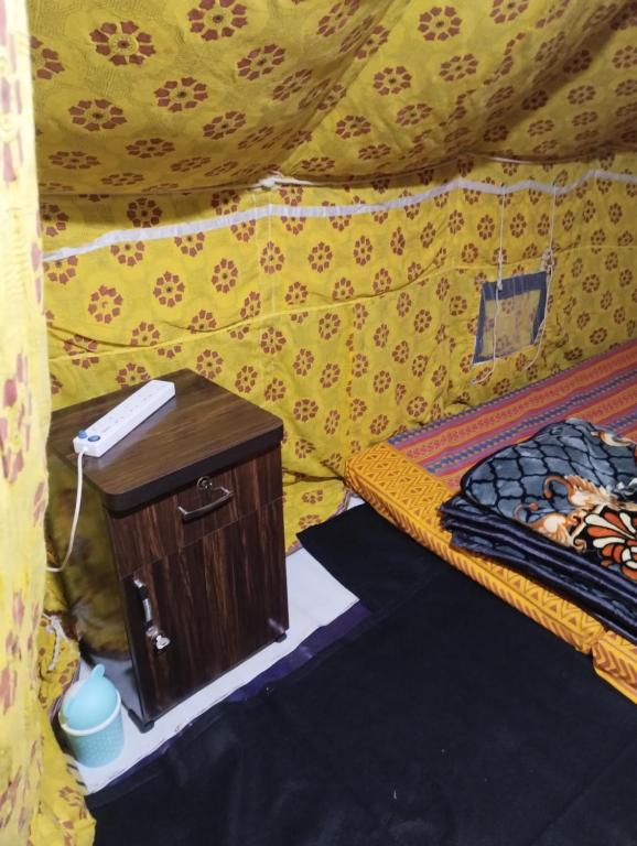 Postel nebo postele na pokoji v ubytování Rooftop budget tent