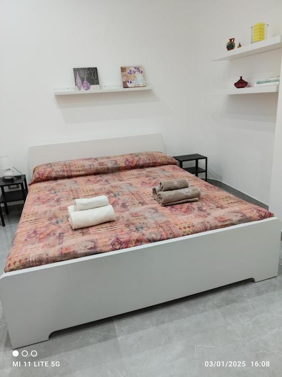 Postel nebo postele na pokoji v ubytování casa di Igor