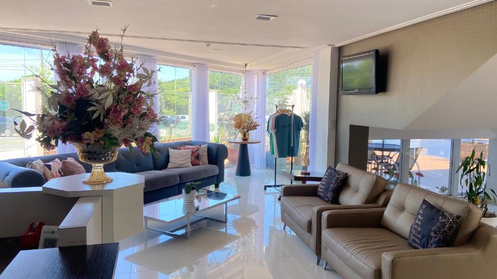 Uma área de estar em Reserva Praia Hotel