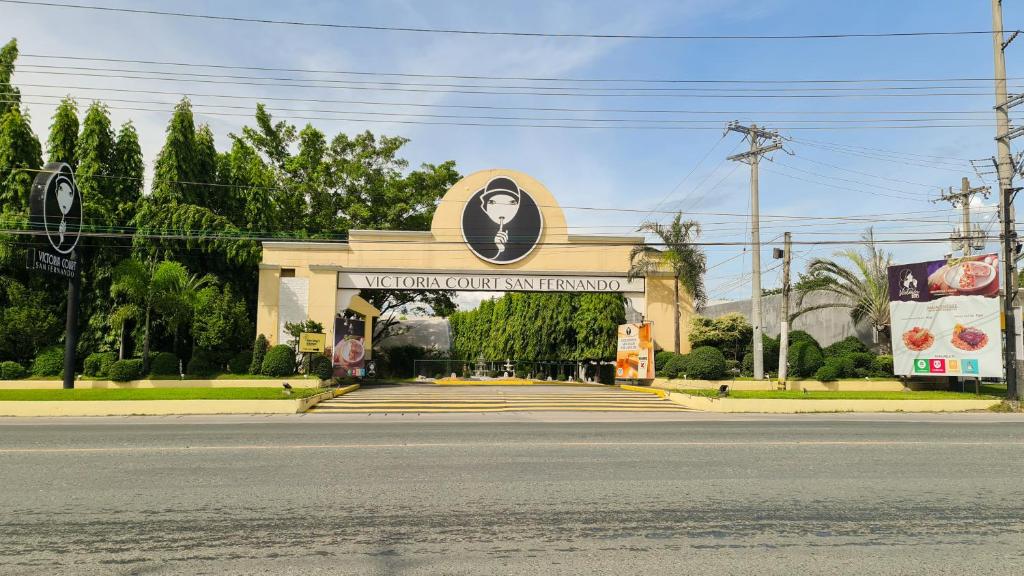 a building with a portrait of a man on it at Victoria Court San Fernando in San Fernando
