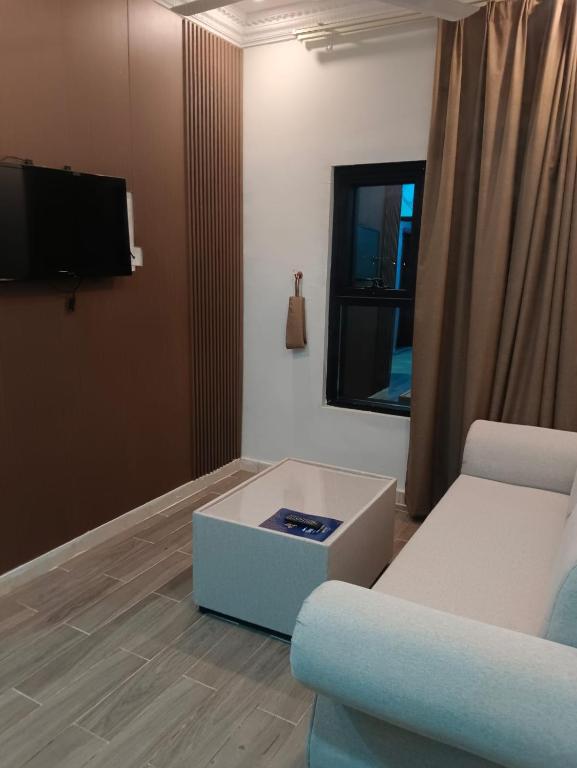 TV a/nebo společenská místnost v ubytování Bait AL-Afiah Apartments