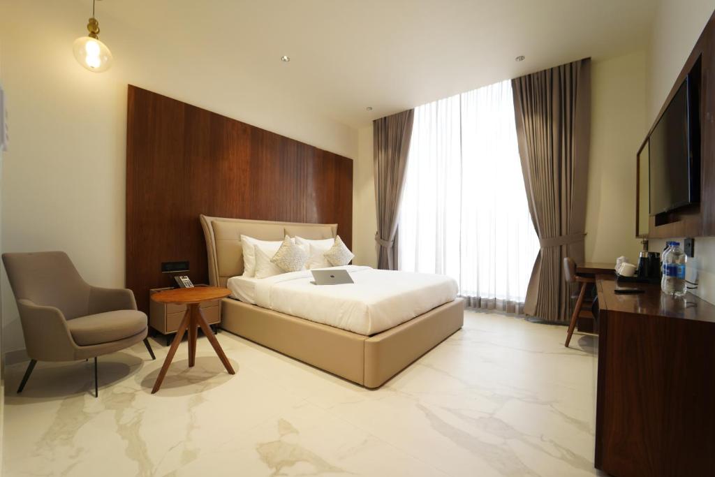 Postel nebo postele na pokoji v ubytování Hotel Millennium