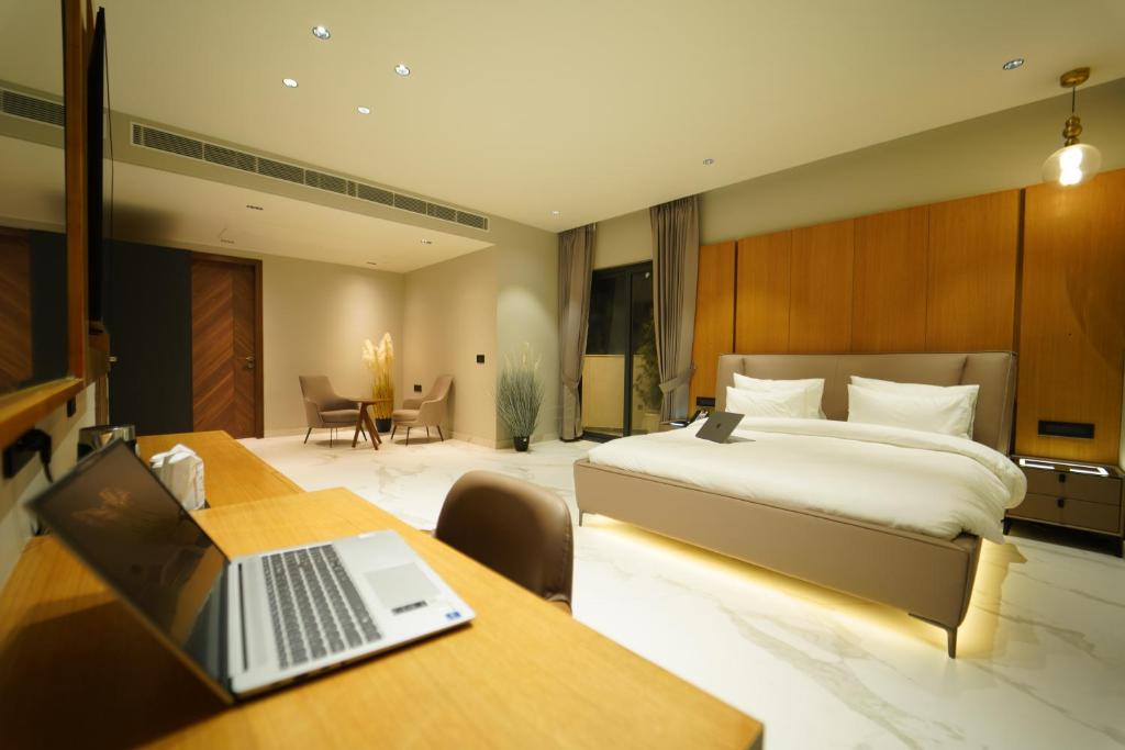 Postel nebo postele na pokoji v ubytování Hotel Millennium