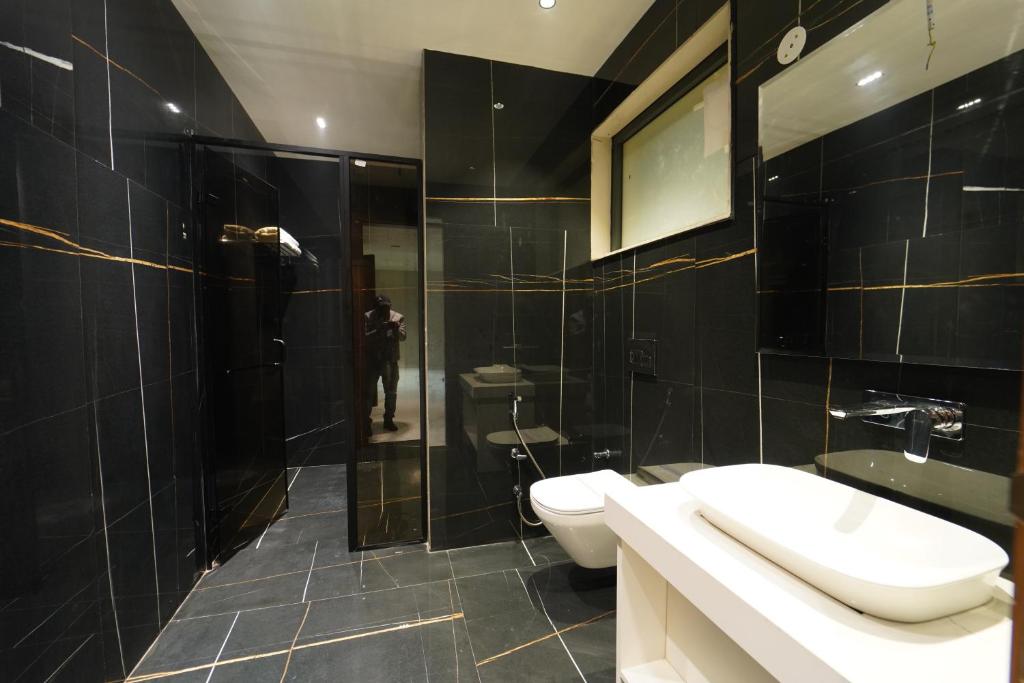 Koupelna v ubytování Hotel Millennium