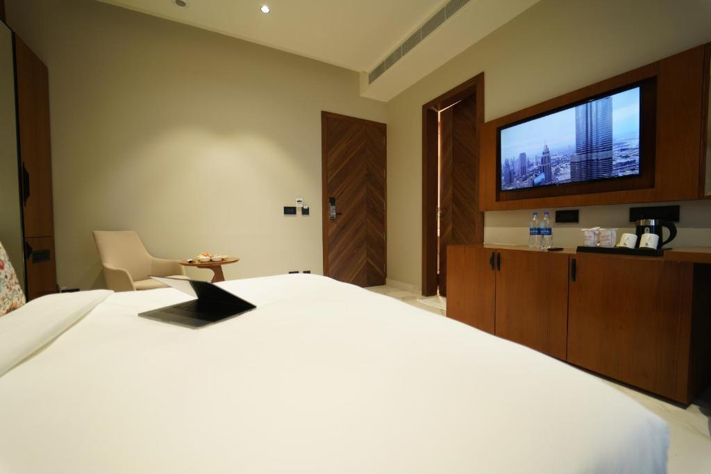 TV a/nebo společenská místnost v ubytování Hotel Millennium