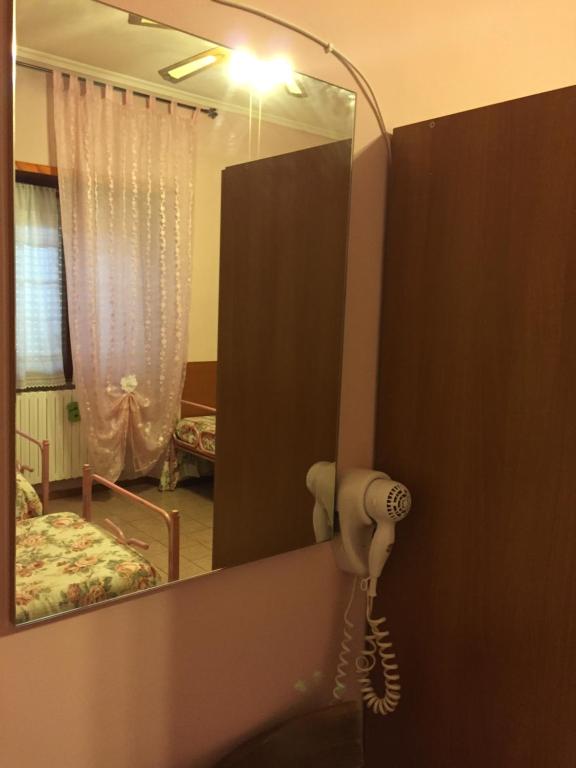 Postel nebo postele na pokoji v ubytování Albergo Anna