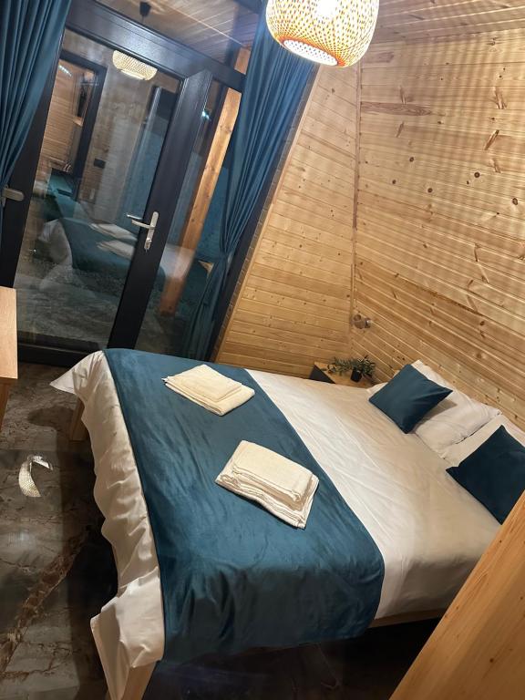 Postel nebo postele na pokoji v ubytování Cabana Lara