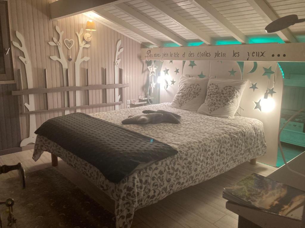 Postel nebo postele na pokoji v ubytování Au Domaine de PY
