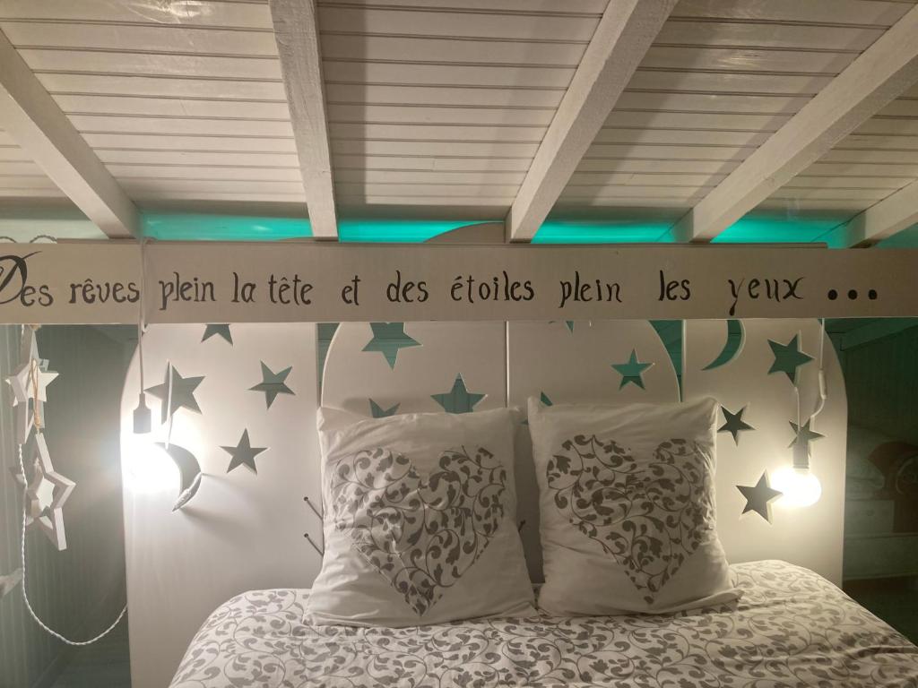 Postel nebo postele na pokoji v ubytování Au Domaine de PY