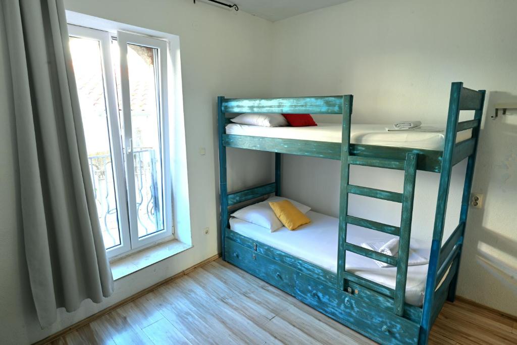Postel nebo postele na pokoji v ubytování White Rabbit Hostel