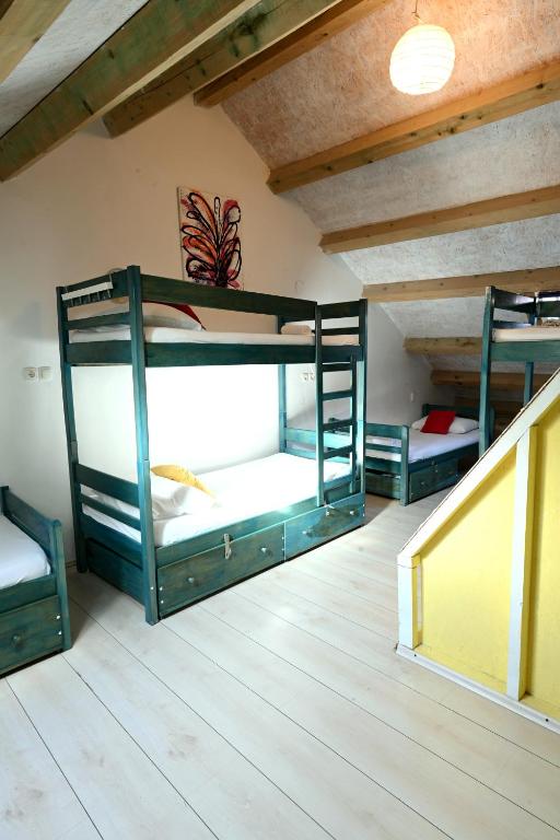 Postel nebo postele na pokoji v ubytování White Rabbit Hostel