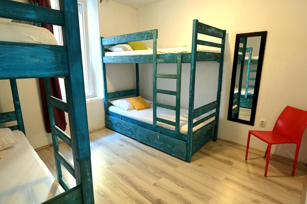 Postel nebo postele na pokoji v ubytování White Rabbit Hostel
