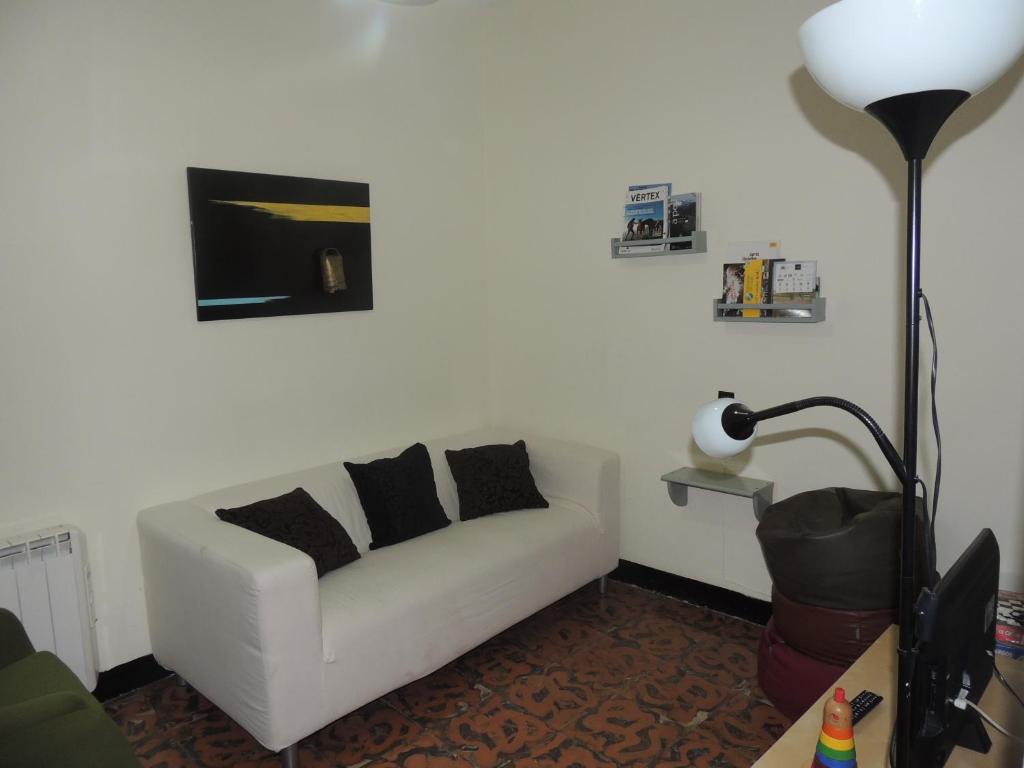 Una televisión o centro de entretenimiento en Fonda Can Fasersia