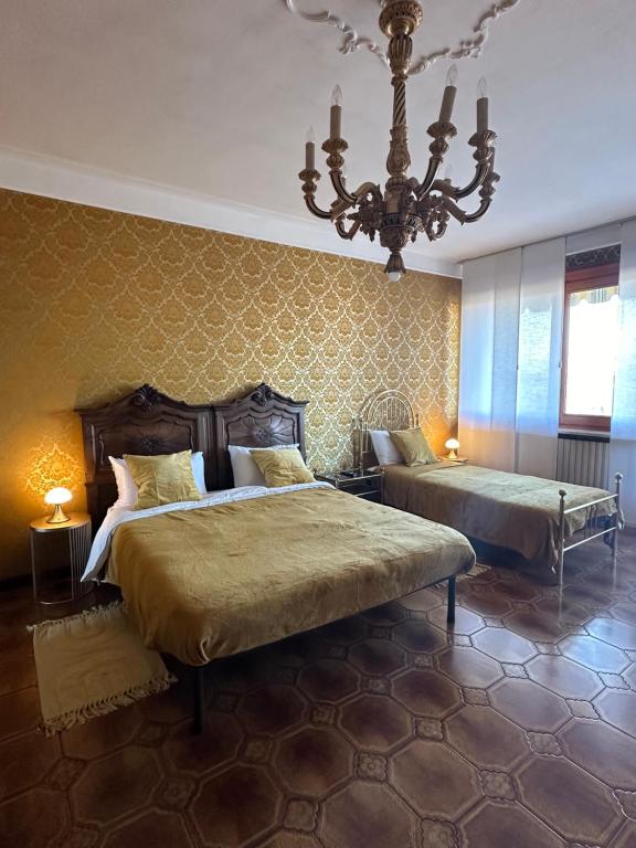 Postel nebo postele na pokoji v ubytování Casa di Martina