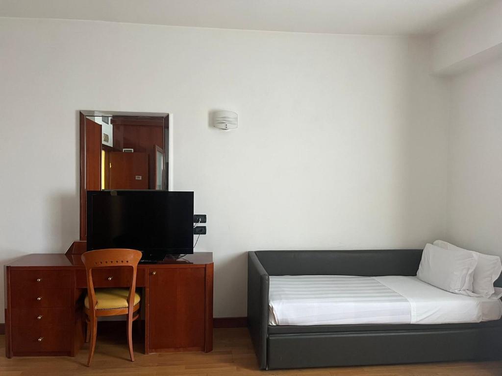 Telewizja i/lub zestaw kina domowego w obiekcie Hotel Napoleon