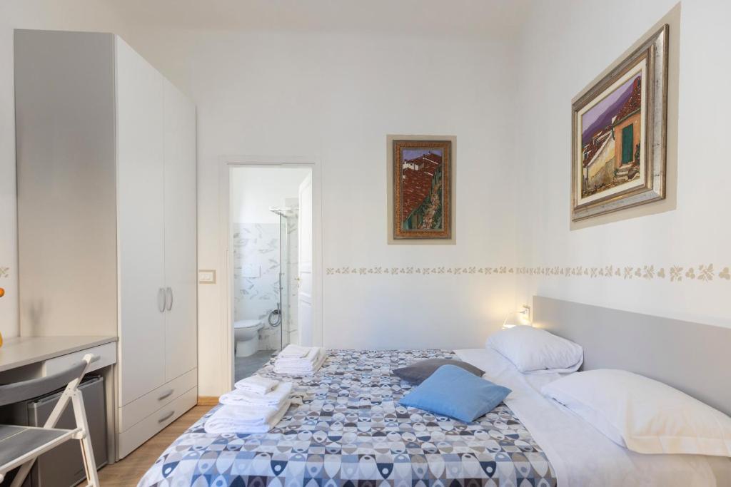 Postel nebo postele na pokoji v ubytování Residenza Portoferraio