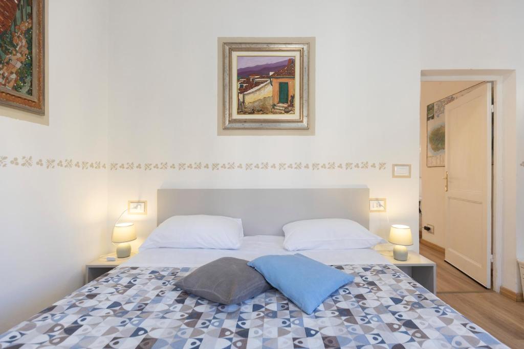 Postel nebo postele na pokoji v ubytování Residenza Portoferraio
