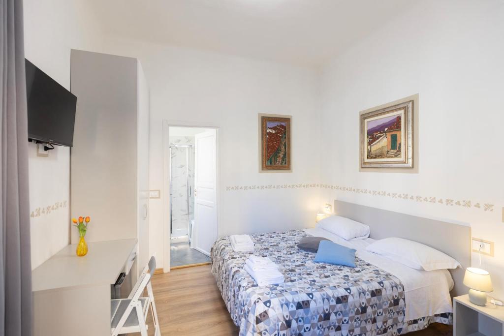 Postel nebo postele na pokoji v ubytování Residenza Portoferraio