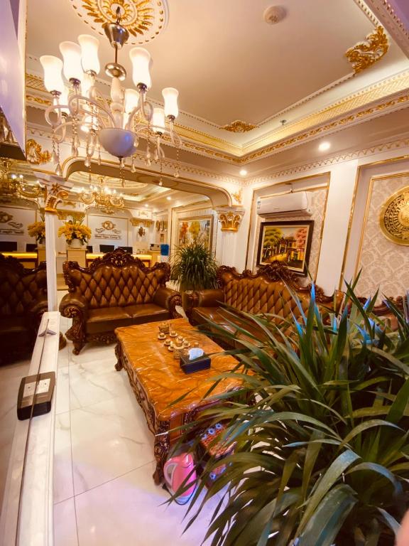 Posezení v ubytování Nam Cường X Hotel