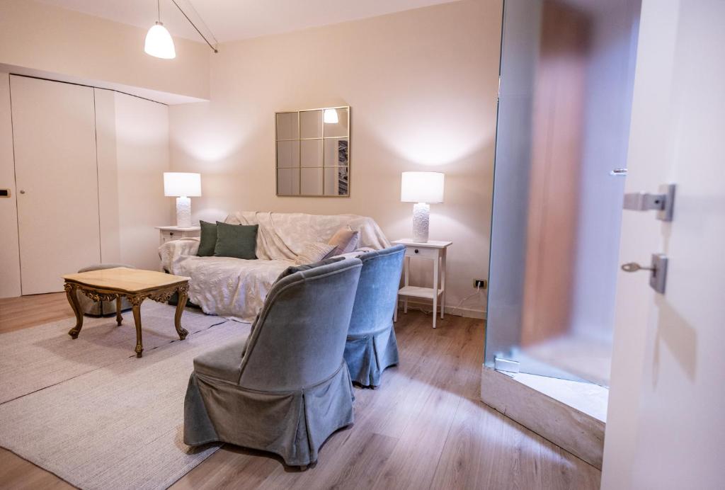Postel nebo postele na pokoji v ubytování Sinatra Suite