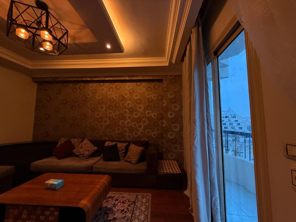 Posezení v ubytování Grand Apartment Pyramids