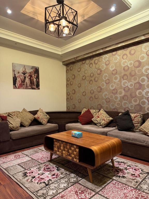 Posezení v ubytování Grand Apartment Pyramids
