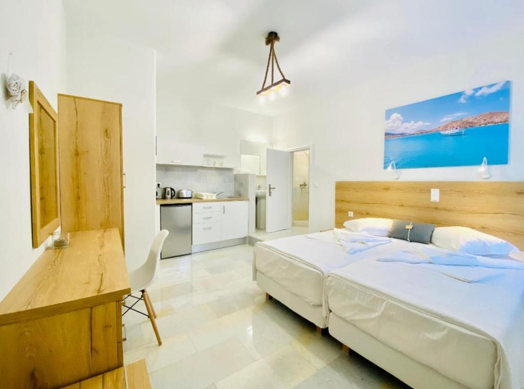 Kuchyň nebo kuchyňský kout v ubytování Heart of Paros Apartments