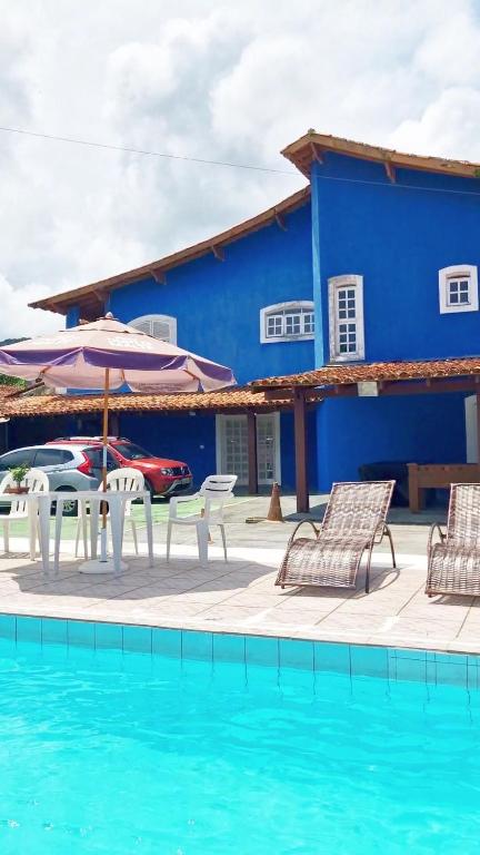 Bazén v ubytování Pousada Genesis Guaruja nebo v jeho okolí